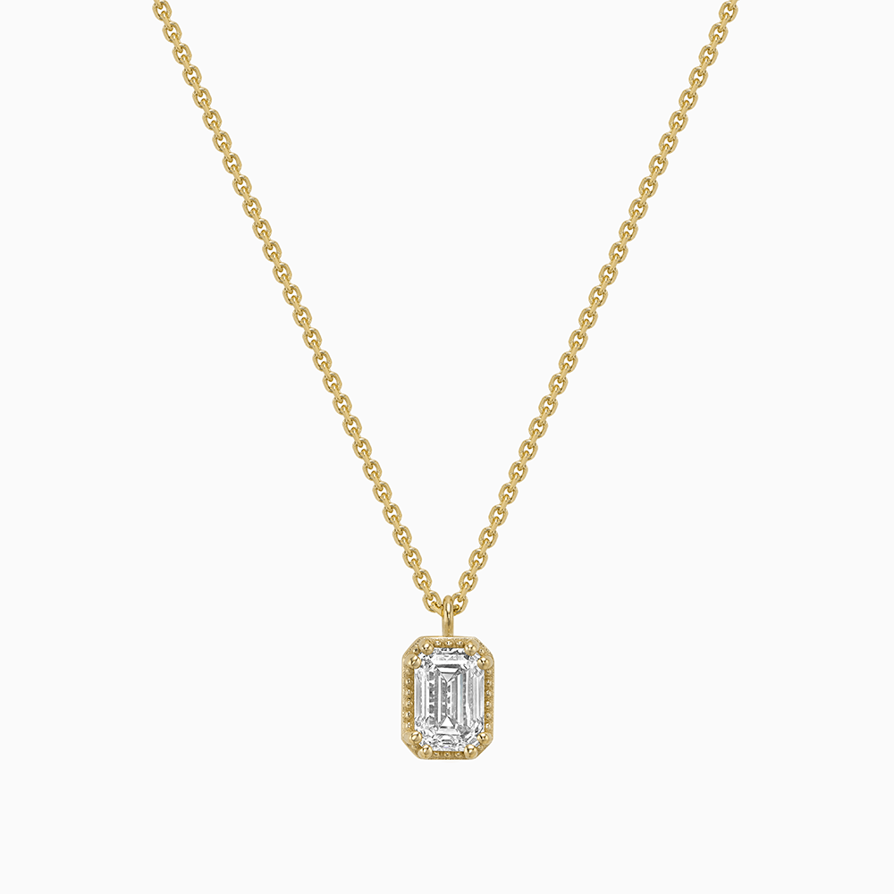 Face view of Ecksand's Emerald Diamond Stackable Necklace with Milgrain Halo in 18k Yellow Gold, Natural VS2+/F+