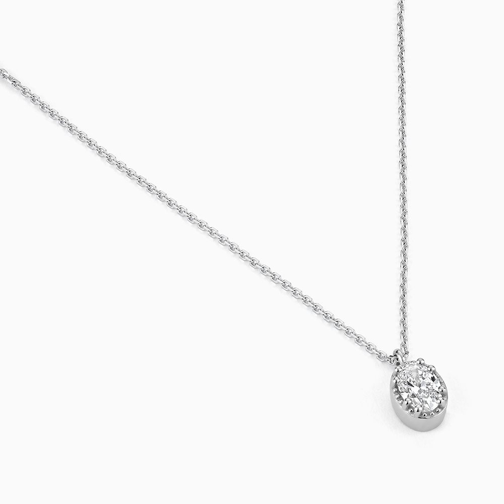 Angled view of Ecksand's Oval Diamond Stackable Necklace with Milgrain Halo in 18k White Gold, Lab-grown VS2+/F+