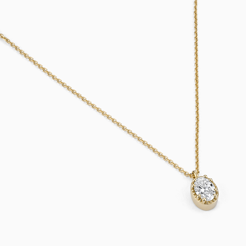 Angled view of Ecksand's Oval Diamond Stackable Necklace with Milgrain Halo in 18k Yellow Gold, Lab-grown VS2+/F+