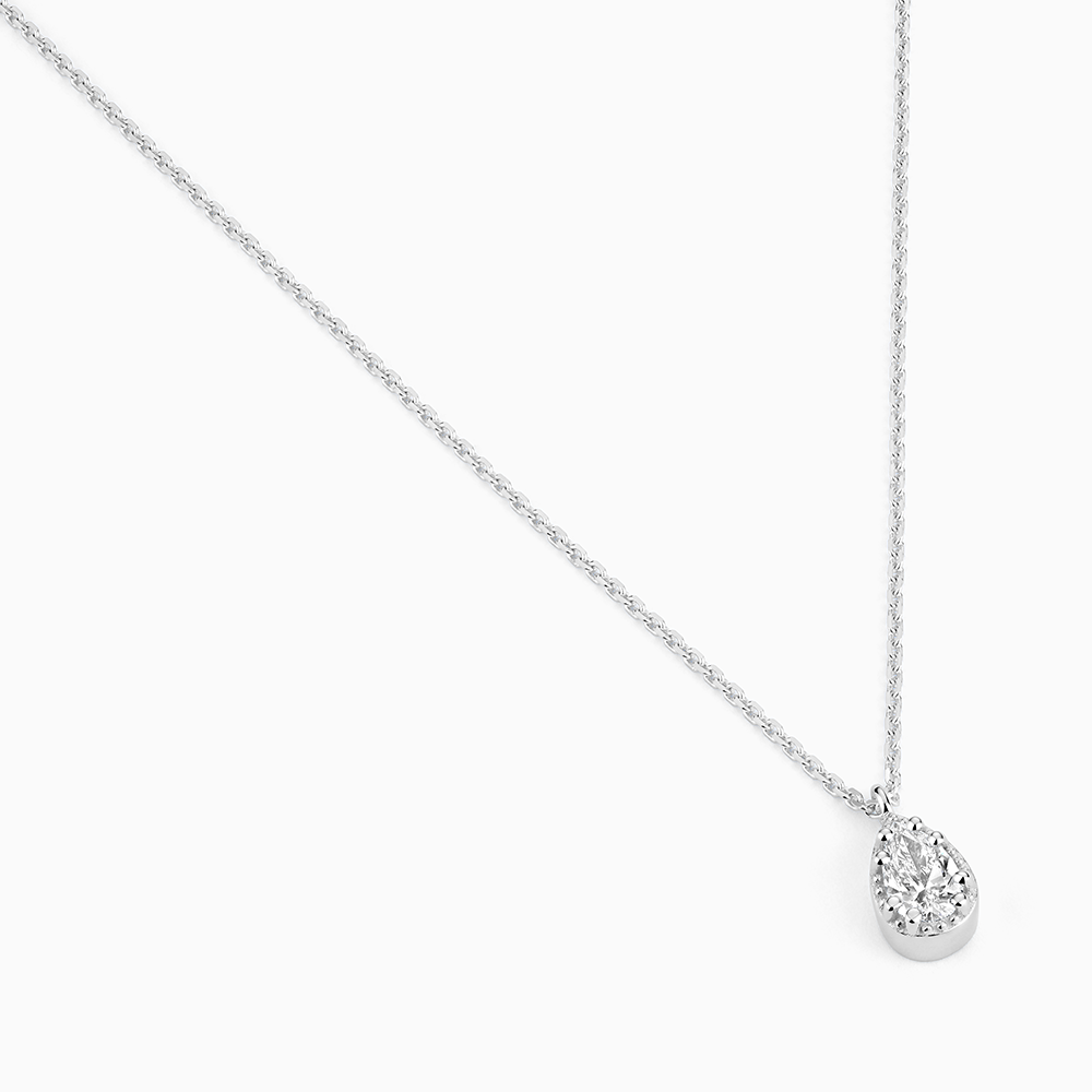 Angled view of Ecksand's Pear Diamond Stackable Necklace with Milgrain Halo in 18k White Gold, Lab-grown VS2+/F+