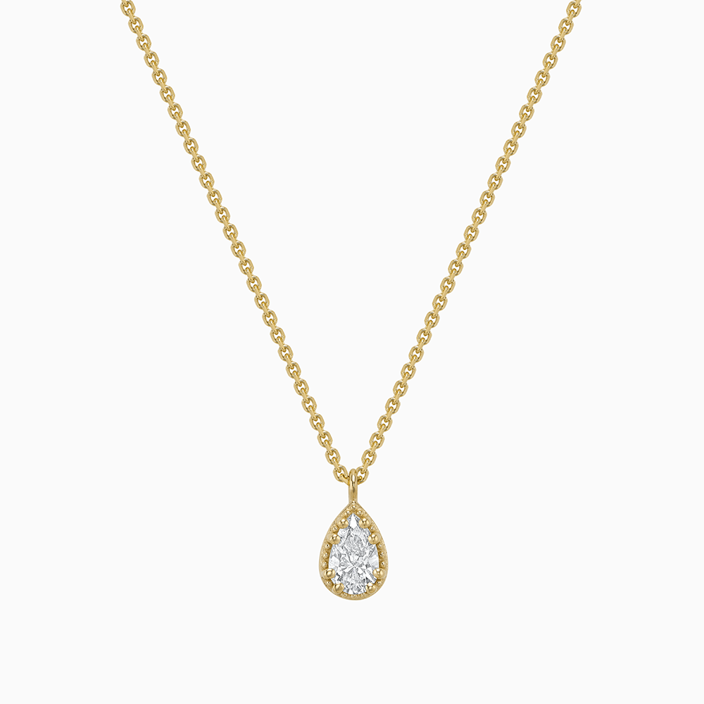 Face view of Ecksand's Pear Diamond Stackable Necklace with Milgrain Halo in 18k Yellow Gold, Lab-grown VS2+/F+