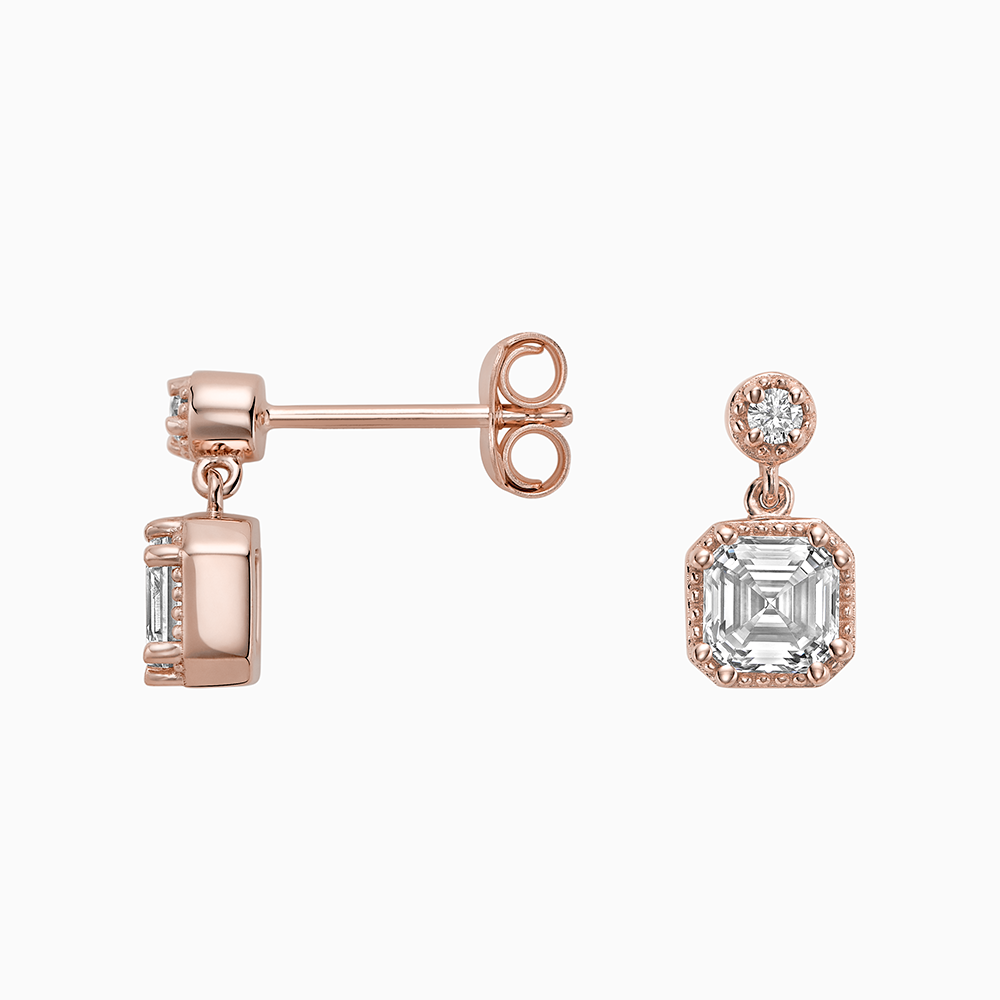 Angled view of Ecksand's Asscher Diamond Stud Earrings with Milgrain Halo and Diamond Accent in 18k Rose Gold, Lab-grown VS2+/ F+