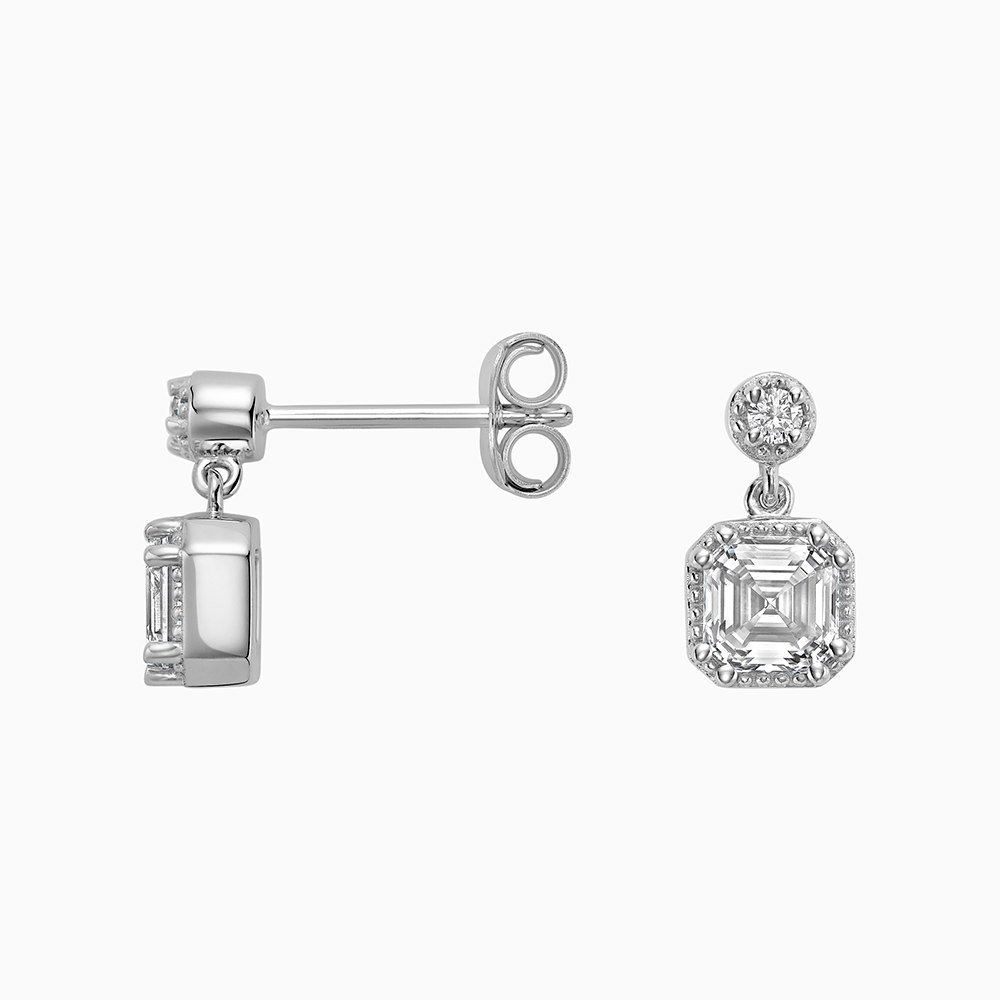 Angled view of Ecksand's Asscher Diamond Stud Earrings with Milgrain Halo and Diamond Accent in 18k White Gold, Lab-grown VS2+/ F+