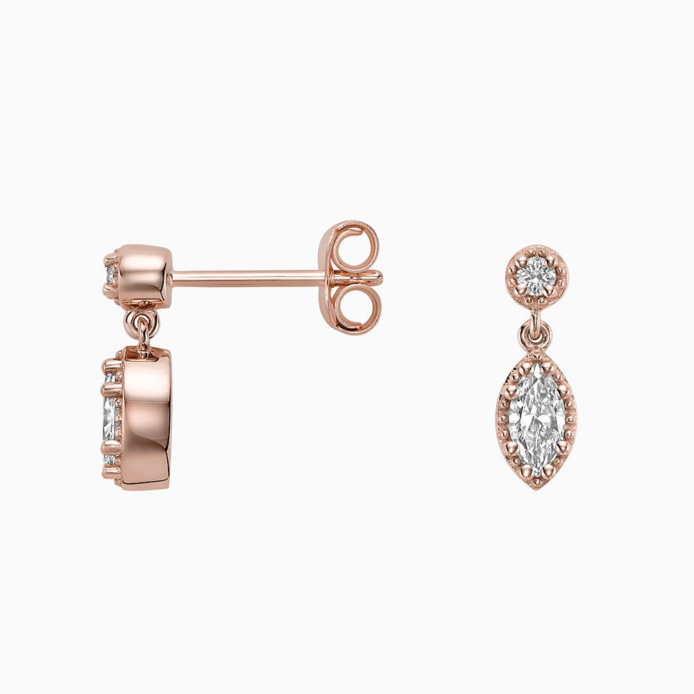 Angled view of Ecksand's Marquise Diamond Stud Earrings with Milgrain Halo and Diamond Accent in 18k Rose Gold, Lab-grown VS2+/ F+