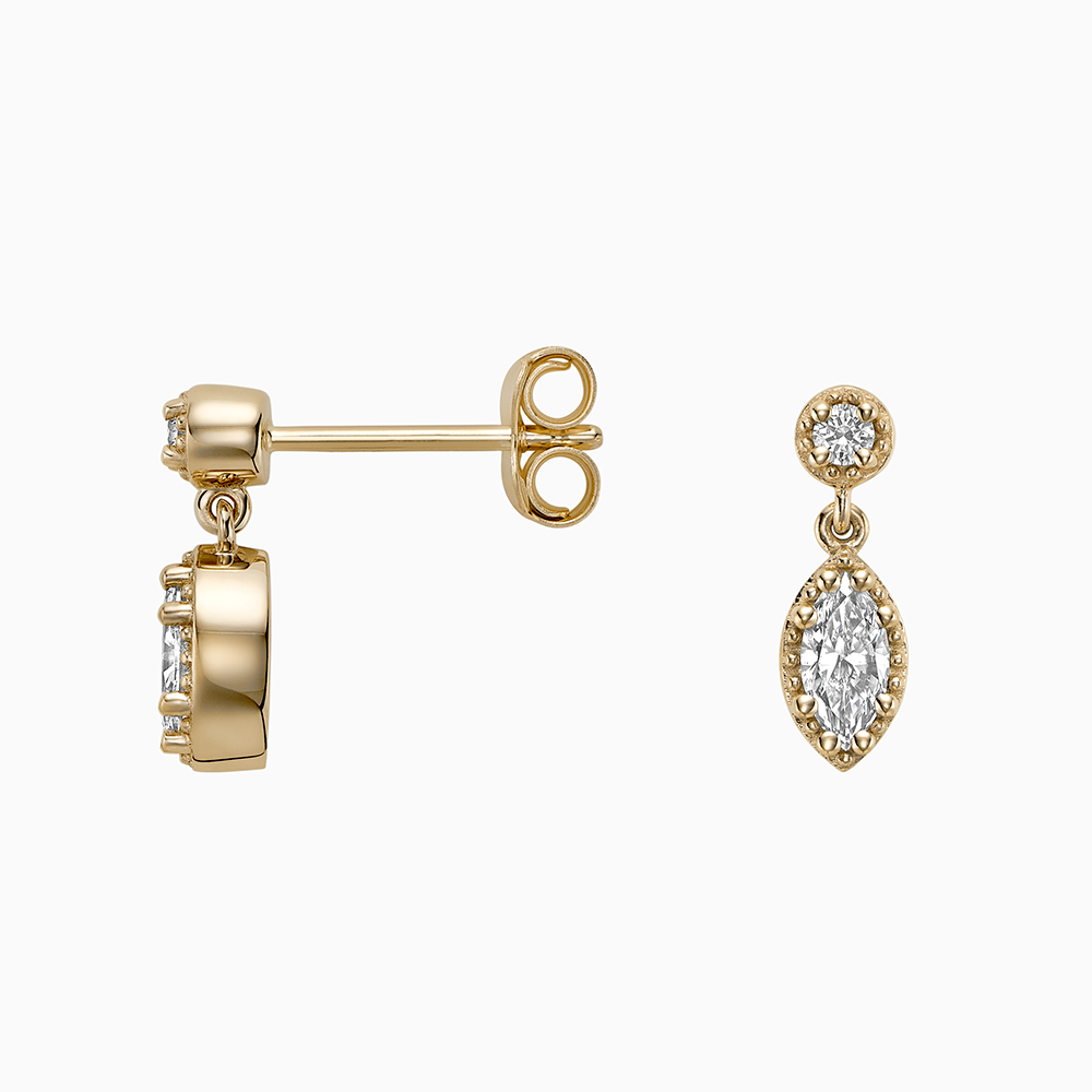 Angled view of Ecksand's Marquise Diamond Stud Earrings with Milgrain Halo and Diamond Accent in 18k Yellow Gold, Lab-grown VS2+/ F+