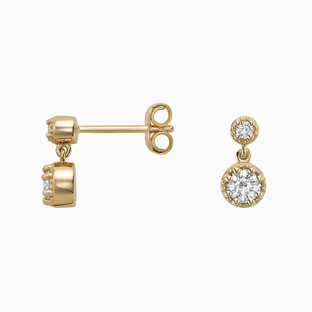 Angled view of Ecksand's Round Diamond Stud Earrings with Milgrain Halo and Diamond Accent in 18k Yellow Gold, Lab-grown VS2+/ F+