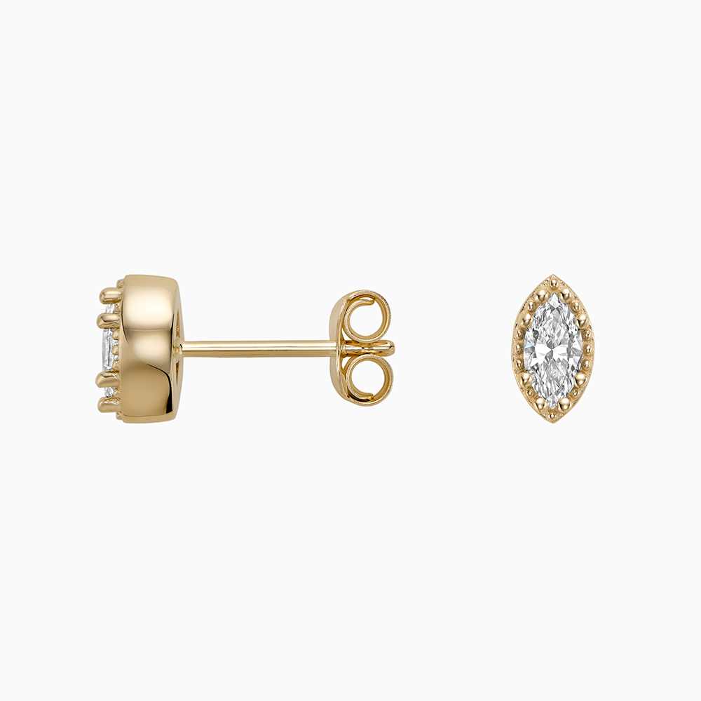 Angled view of Ecksand's Marquise Diamond Stud Earrings with Milgrain Halo in 18k Yellow Gold, Lab-grown VS2+/ F+