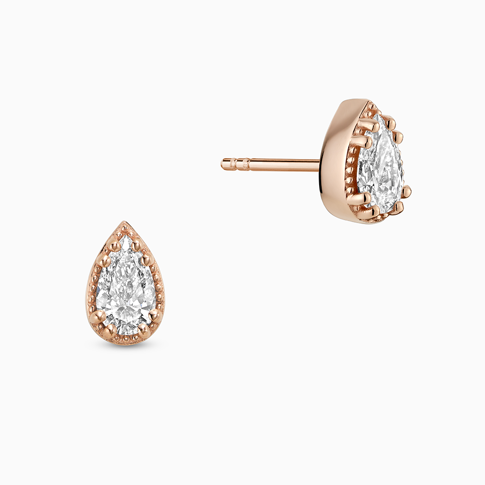 Face view of Ecksand's Pear Diamond Stud Earrings with Milgrain Halo in 18k Rose Gold, Lab-grown VS2+/ F+