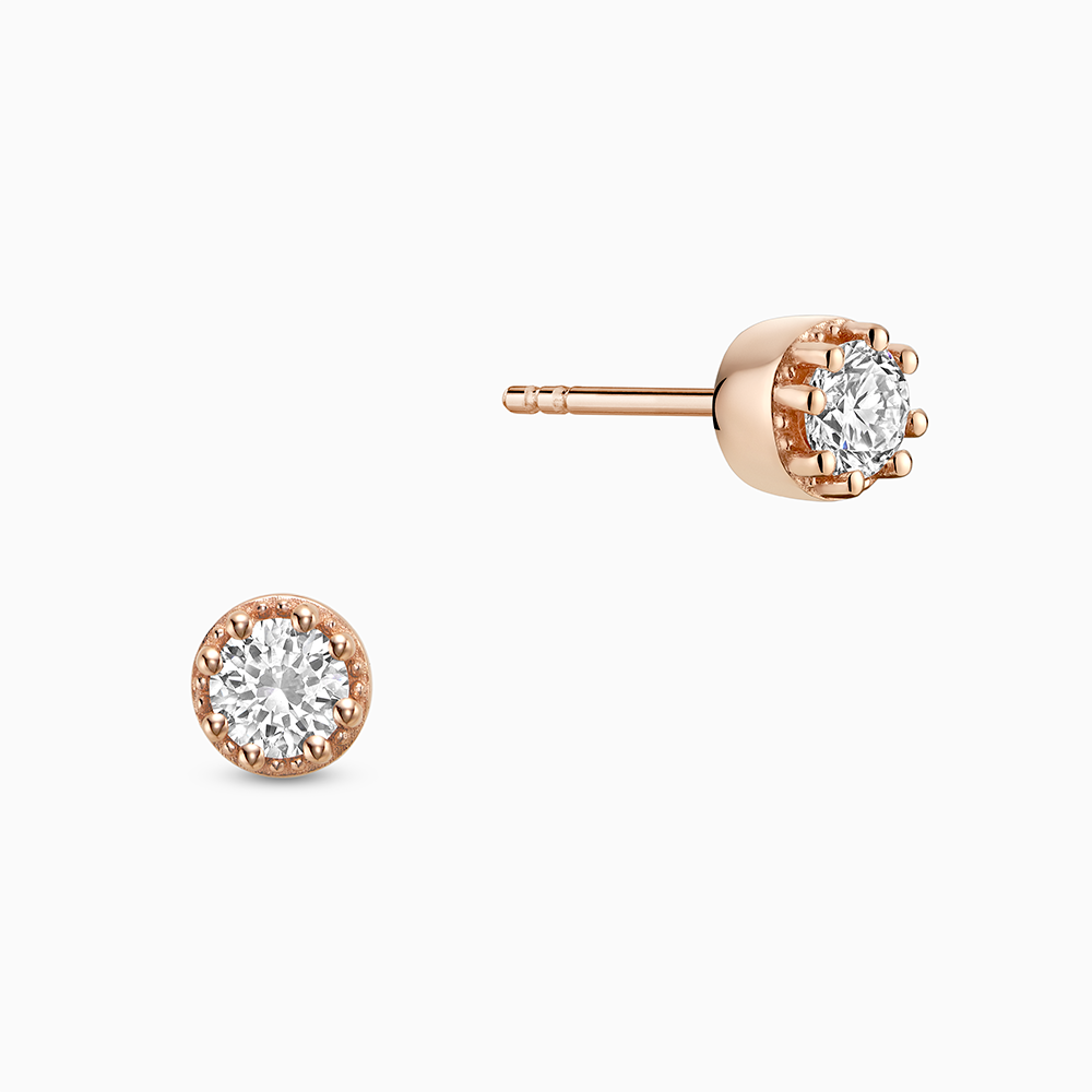 Face view of Ecksand's Round Diamond Stud Earrings with Milgrain Halo in 18k Rose Gold, Lab-grown VS2+/ F+