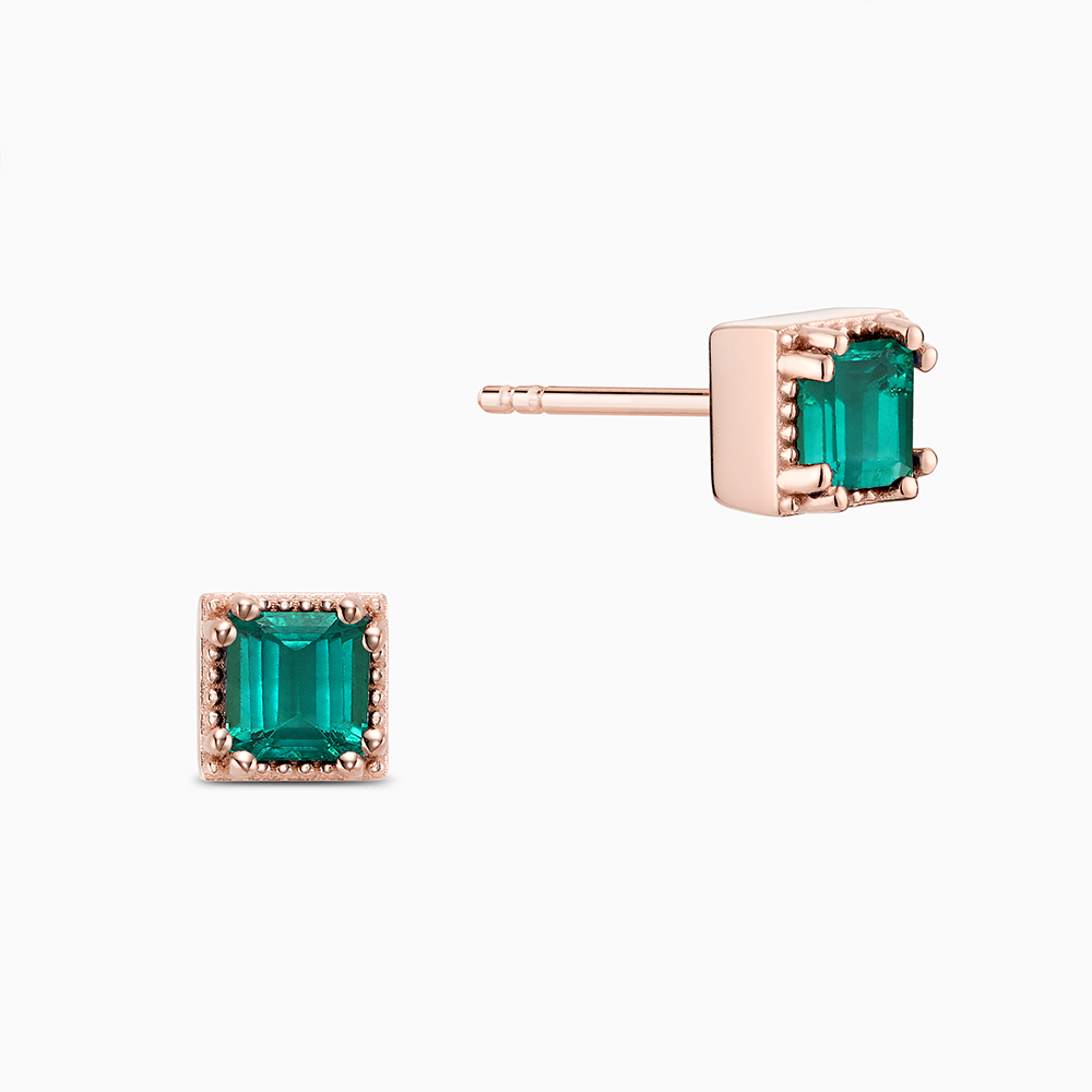 Face view of Ecksand's Asscher Emerald Stud Earrings with Milgrain Halo in 18k Rose Gold