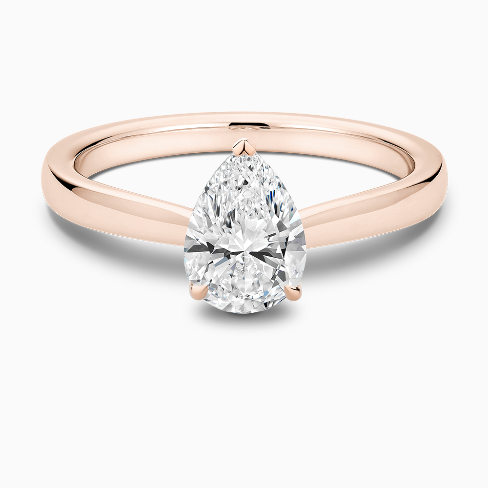 The Ecksand Love-Knot Solitaire Diamond Engagement Ring with Eagle Prongs shown with Pear in 14k Rose Gold