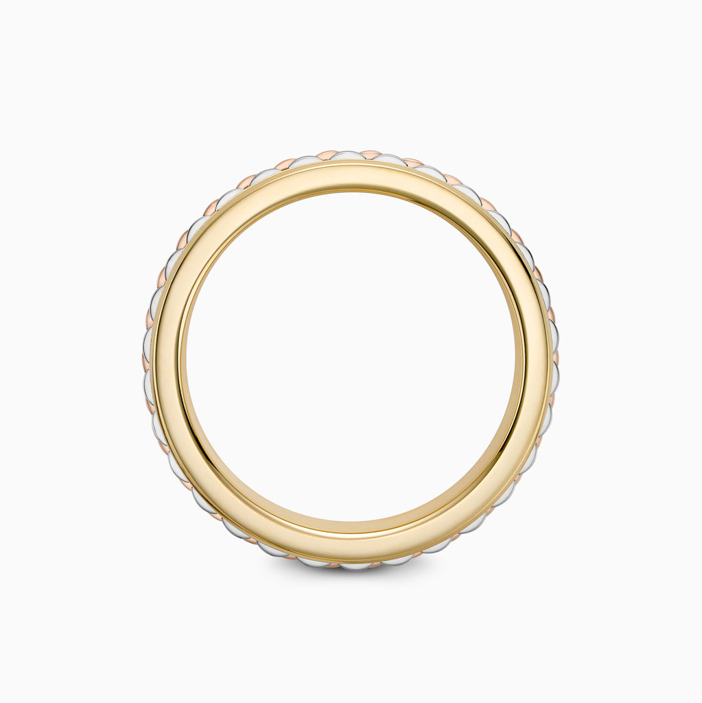 The Ecksand Three-Tone Ridged Wedding Ring shown with  in 