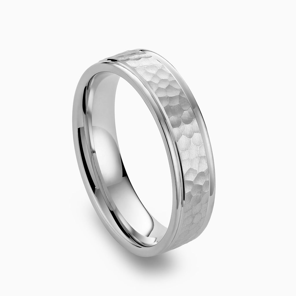 The Ecksand Brushed Hammered Wedding Ring shown with  in 