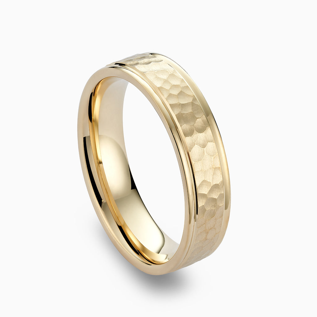 The Ecksand Brushed Hammered Wedding Ring shown with  in 