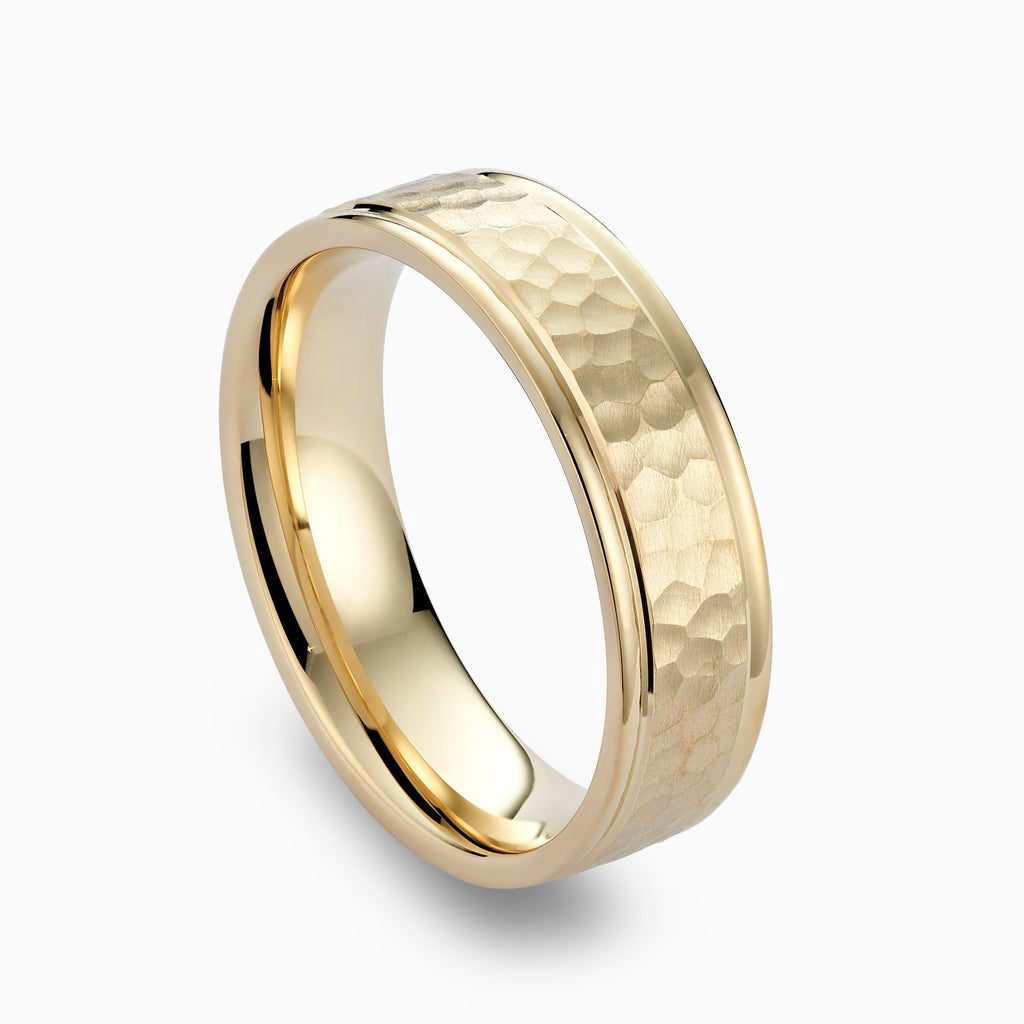 The Ecksand Brushed Hammered Wedding Ring shown with  in 