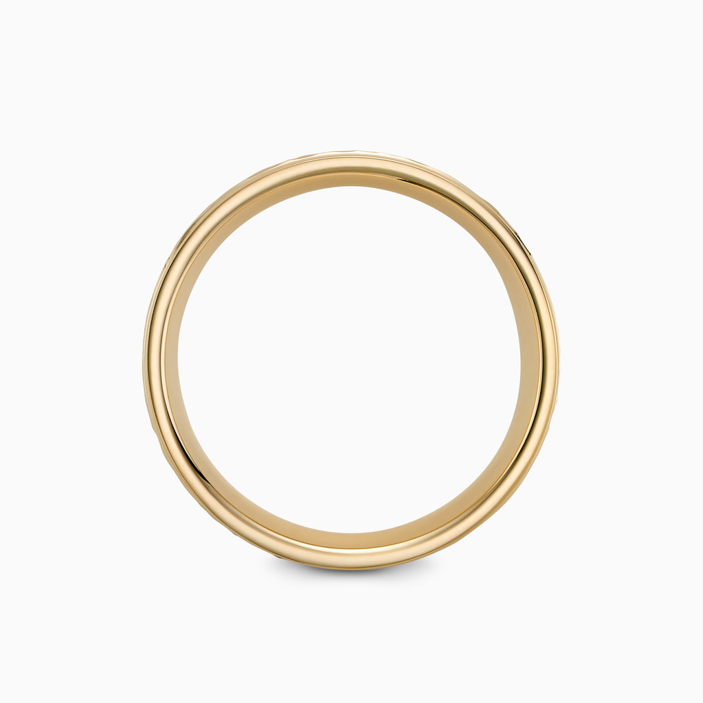 The Ecksand Brushed Hammered Wedding Ring shown with  in 