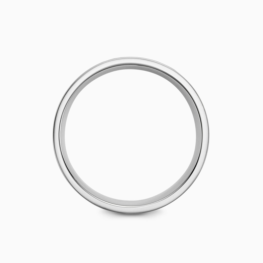 The Ecksand Hammered Wedding Ring shown with  in 