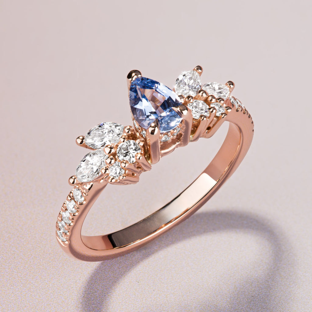 The Ecksand Cluster Engagement Ring with Blue Sapphire and Hidden Halo shown with  in 