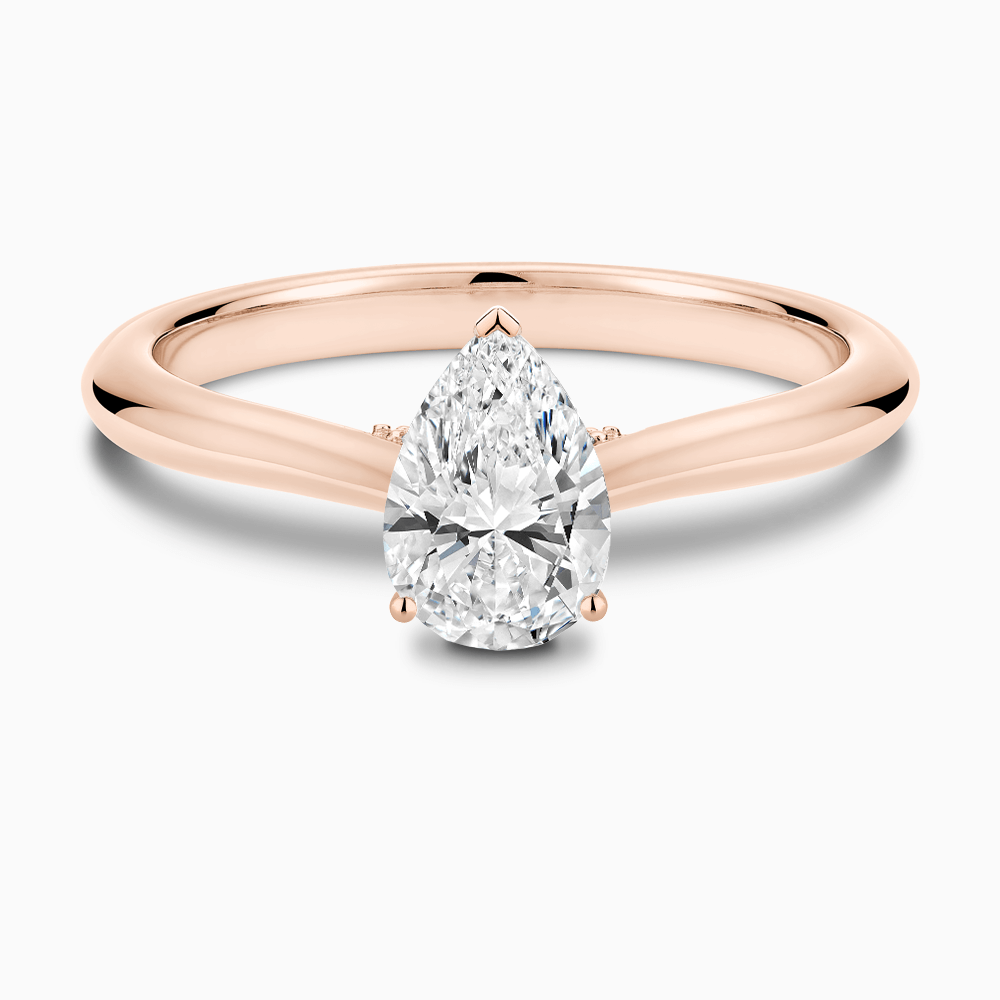 The Ecksand Cathedral-Setting Diamond Engagement Ring with Diamond Bridge shown with Pear in 14k Rose Gold