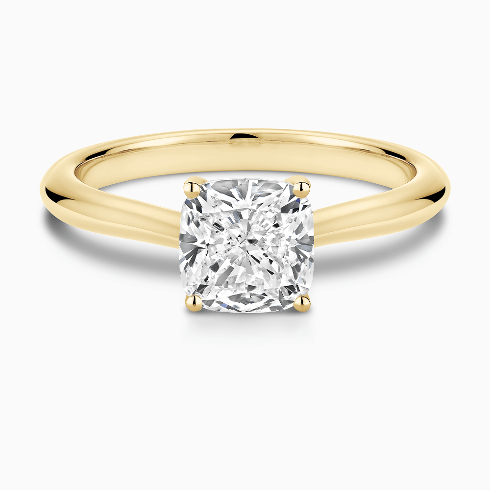 The Ecksand Cathedral-Setting Diamond Engagement Ring with Diamond Bridge shown with Cushion in 18k Yellow Gold