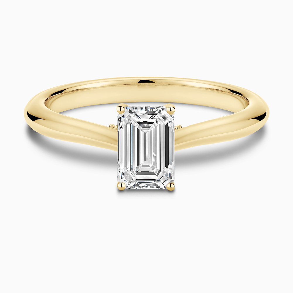 The Ecksand Cathedral-Setting Diamond Engagement Ring with Diamond Bridge shown with Emerald in 18k Yellow Gold