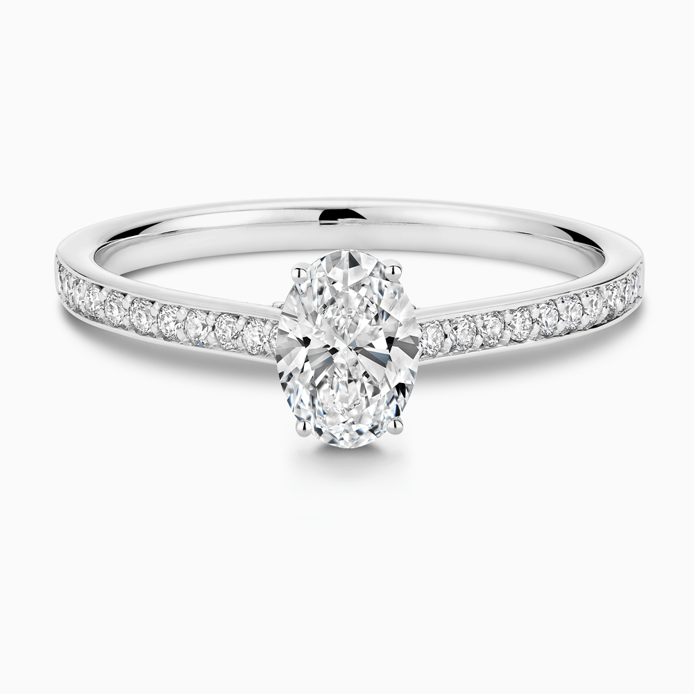 The Ecksand Diamond Engagement Ring with Bright-Cut Band and Diamond Bridge shown with Oval in 18k White Gold