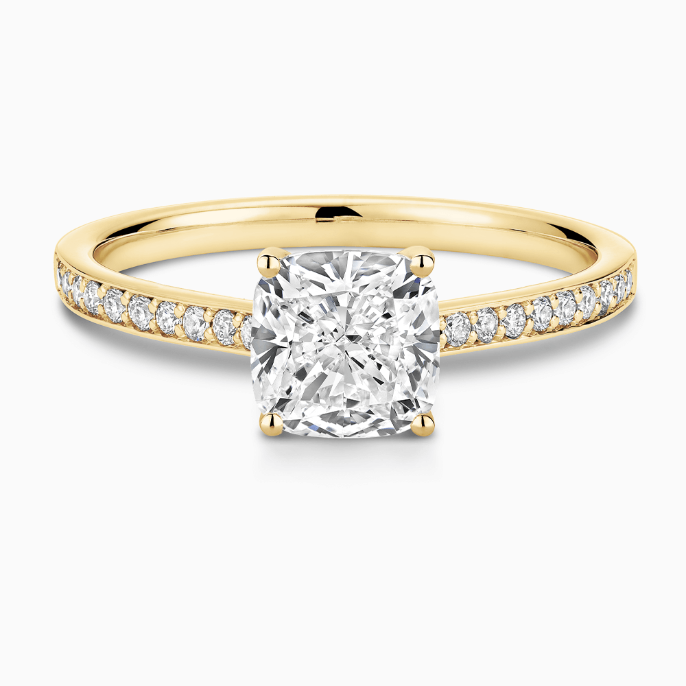 The Ecksand Diamond Engagement Ring with Bright-Cut Band and Diamond Bridge shown with Cushion in 18k Yellow Gold