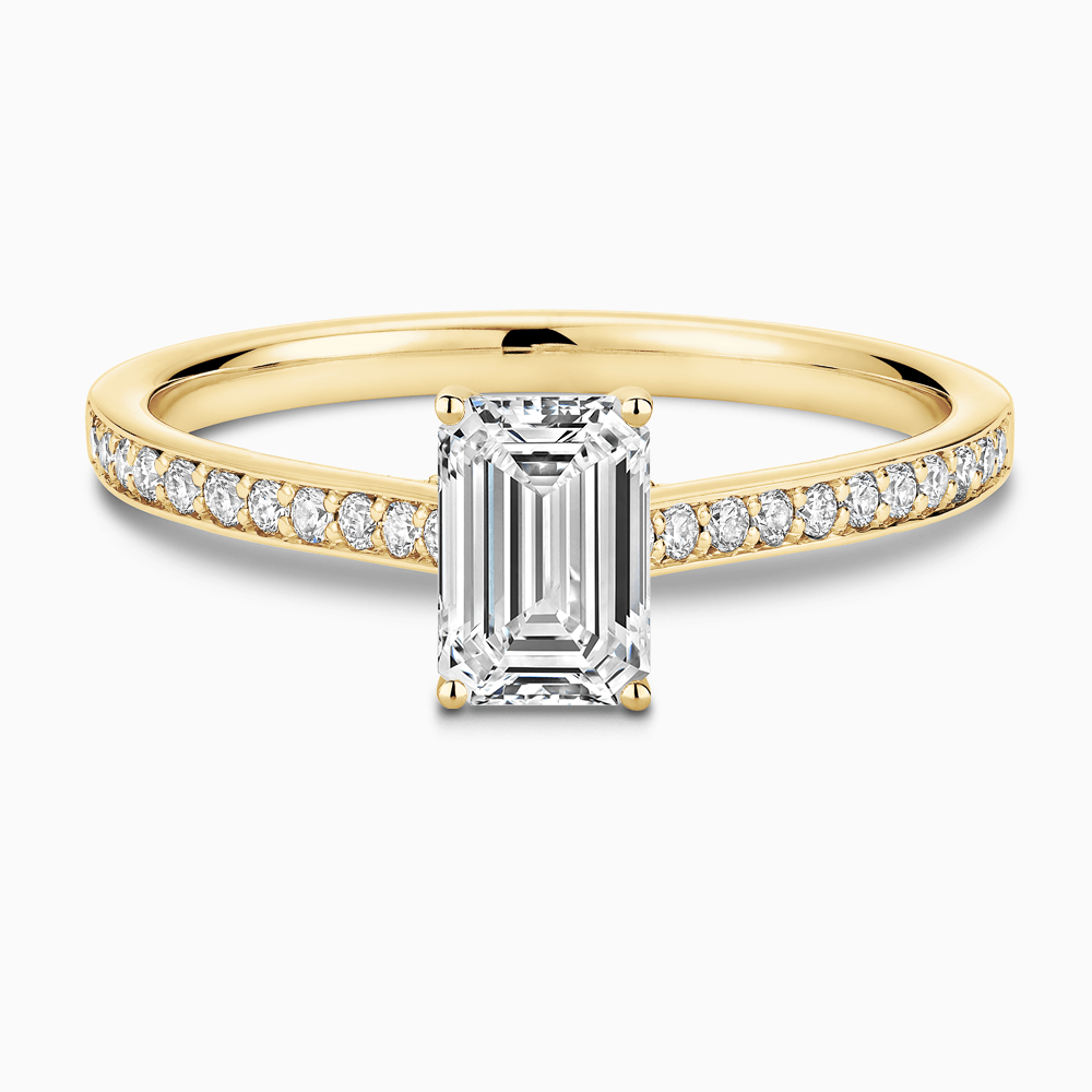 The Ecksand Diamond Engagement Ring with Bright-Cut Band and Diamond Bridge shown with Emerald in 18k Yellow Gold