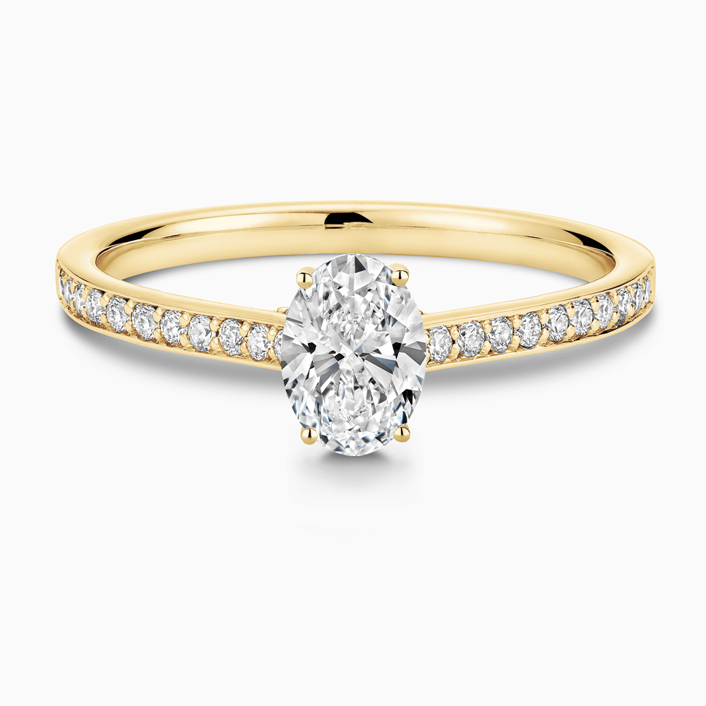 The Ecksand Diamond Engagement Ring with Bright-Cut Band and Diamond Bridge shown with Oval in 18k Yellow Gold