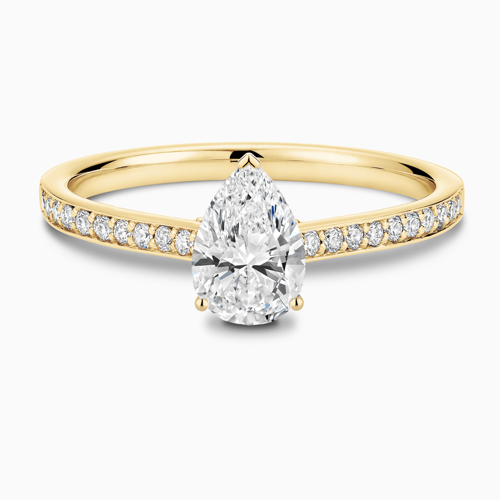 The Ecksand Diamond Engagement Ring with Bright-Cut Band and Diamond Bridge shown with Pear in 18k Yellow Gold