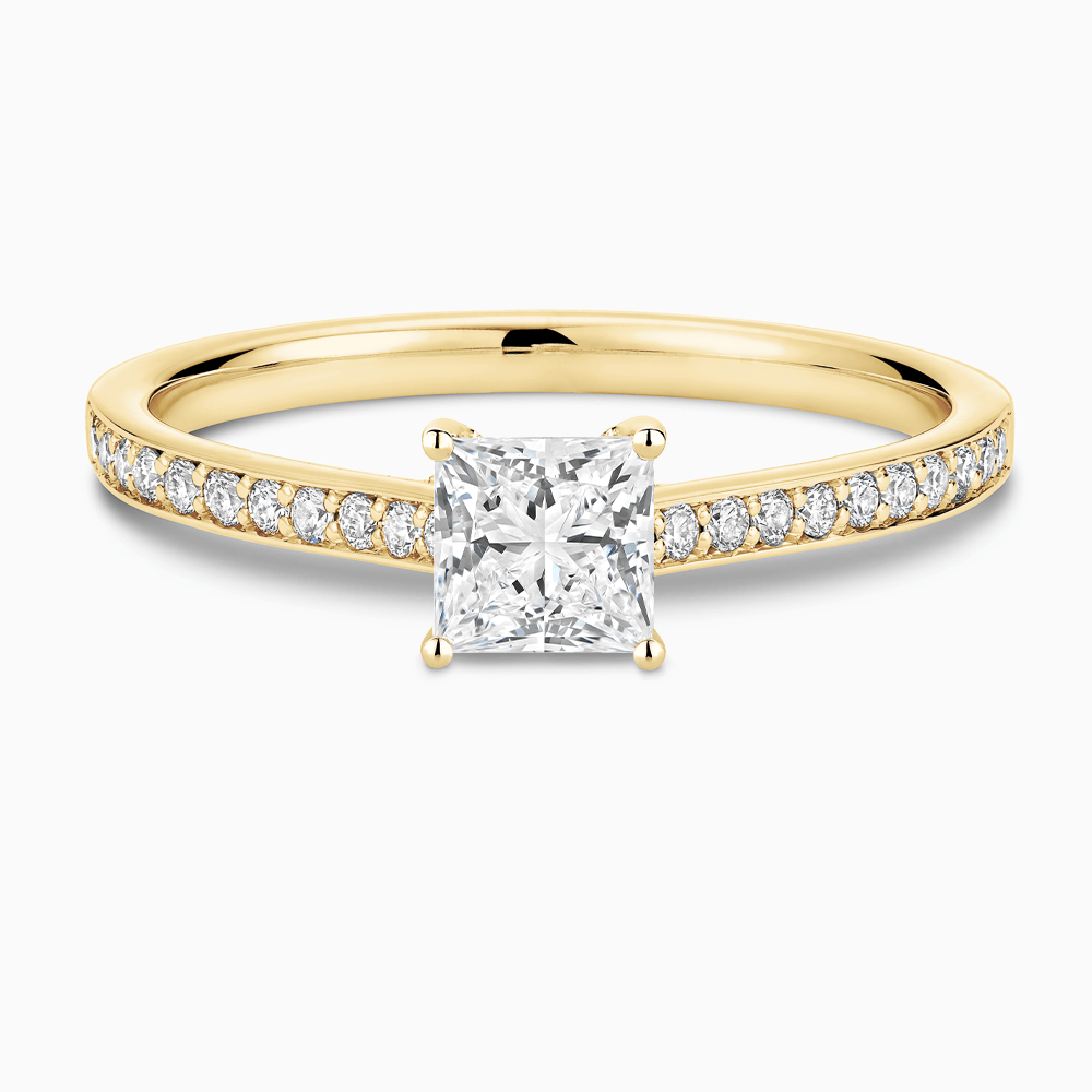 The Ecksand Diamond Engagement Ring with Bright-Cut Band and Diamond Bridge shown with Princess in 18k Yellow Gold
