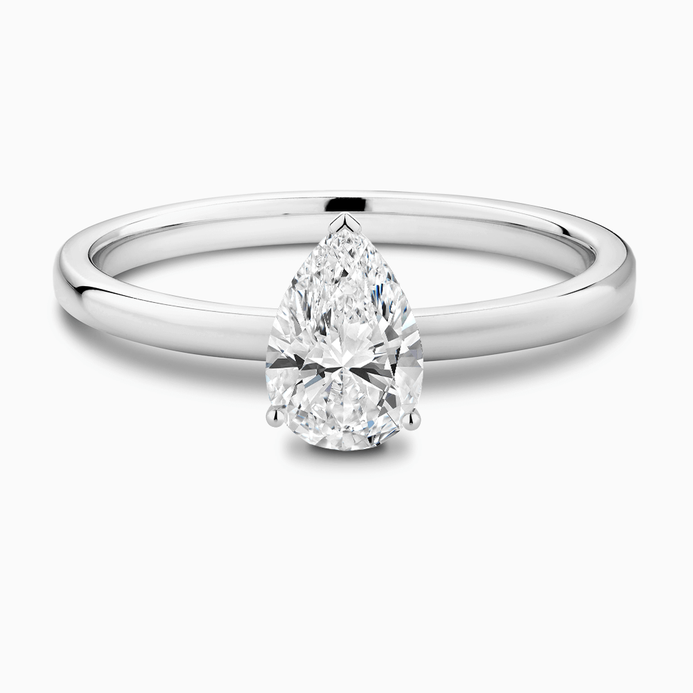 The Ecksand Solitaire Diamond Engagement Ring with Basket Setting shown with Pear in 18k White Gold