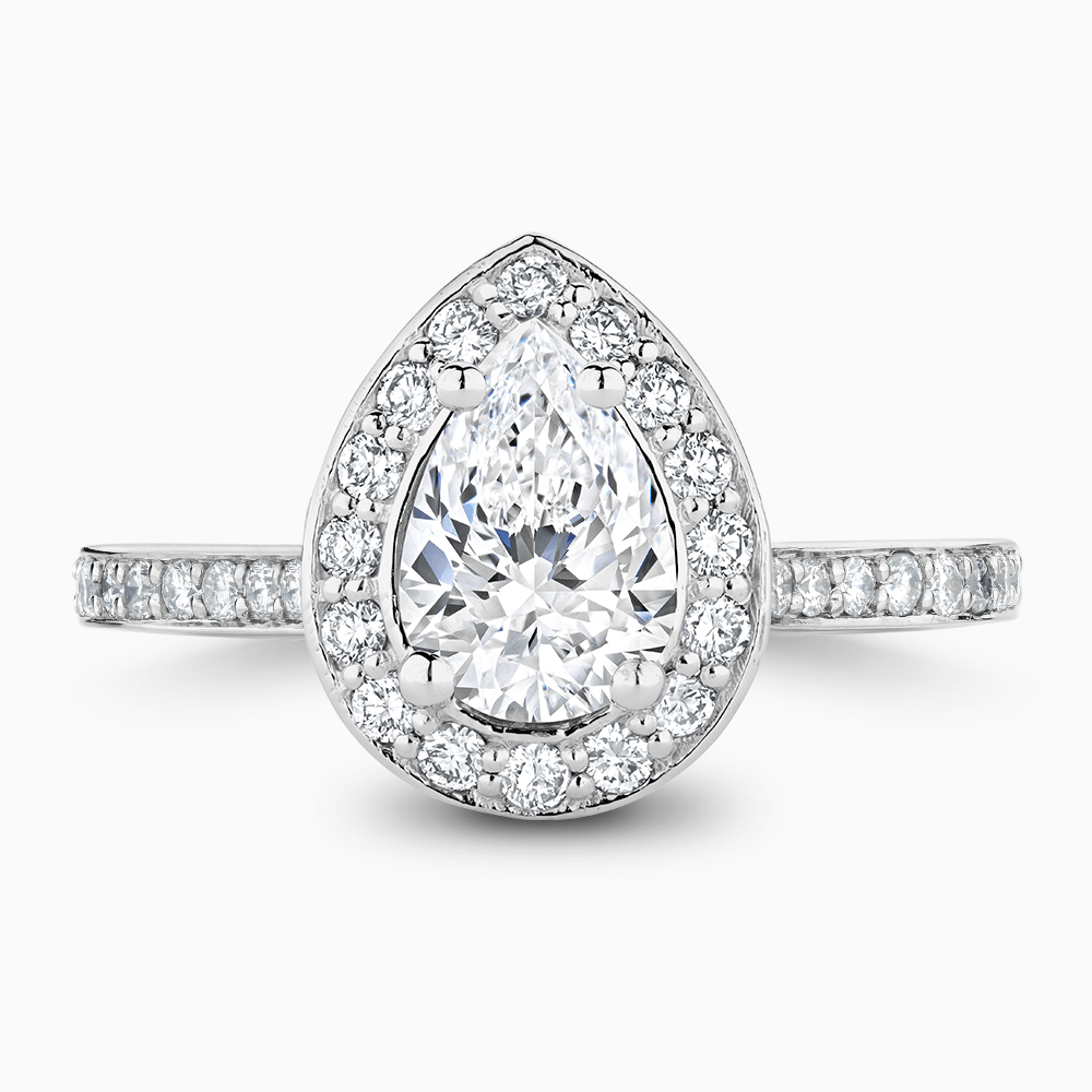 The Ecksand Diamond Halo Engagement Ring with Bright-Cut Diamond Band shown with Pear in 18k White Gold