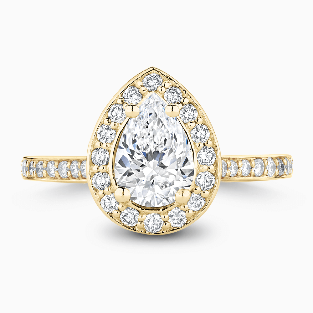 The Ecksand Diamond Halo Engagement Ring with Bright-Cut Diamond Band shown with Pear in 18k Yellow Gold