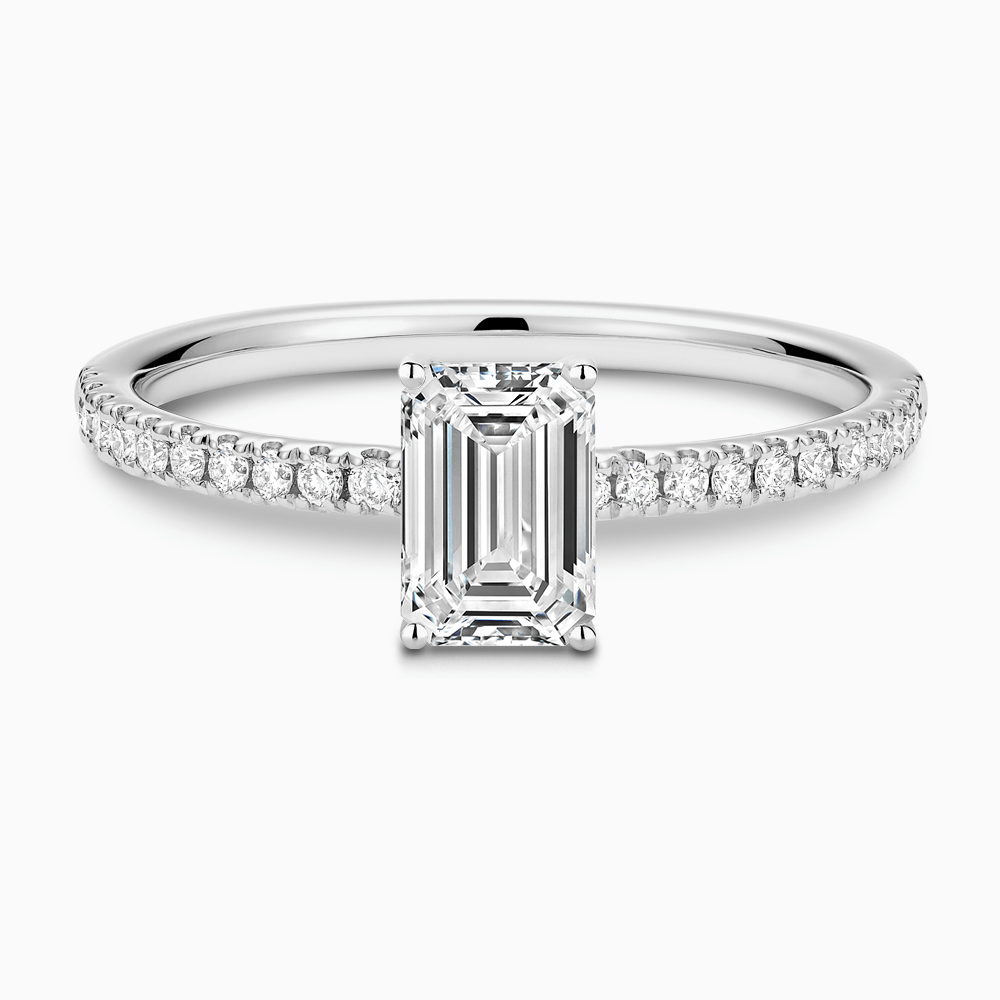 The Ecksand Basket-Setting Diamond Engagement Ring with Diamond Bridge shown with Emerald in 18k White Gold