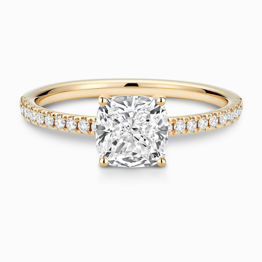 The Ecksand Basket-Setting Diamond Engagement Ring with Diamond Bridge shown with Cushion in 18k Yellow Gold