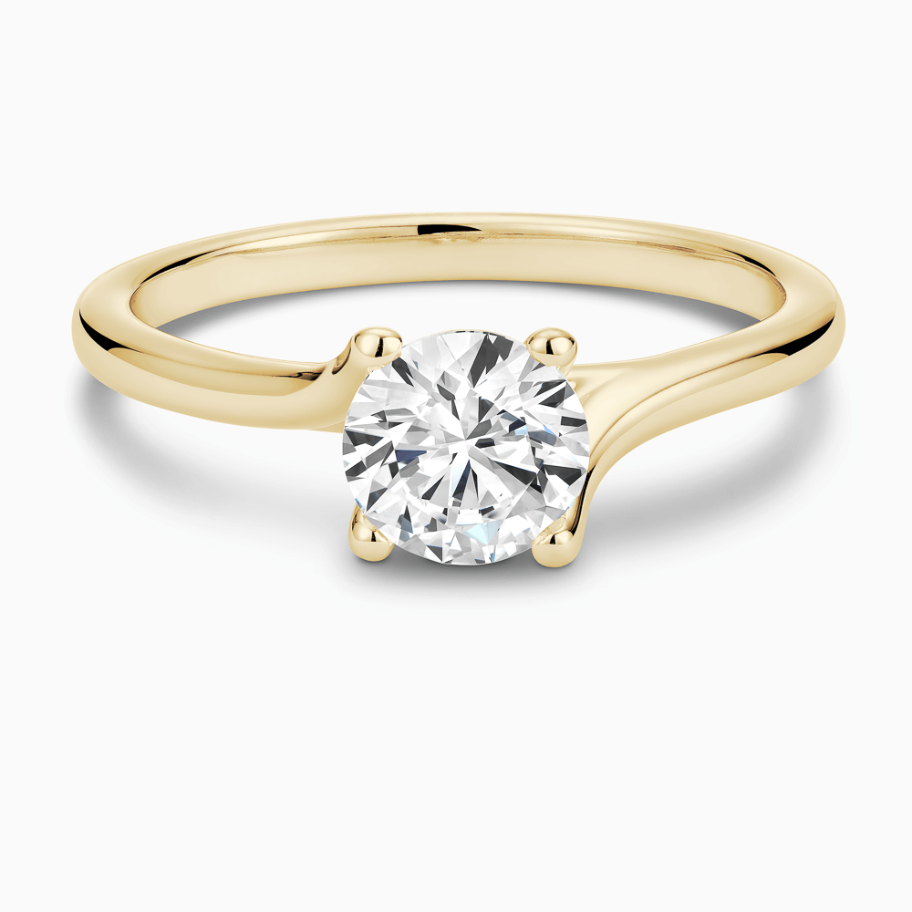 The Ecksand Solitaire Diamond Engagement Ring with Twisted Setting shown with Round in 18k Yellow Gold