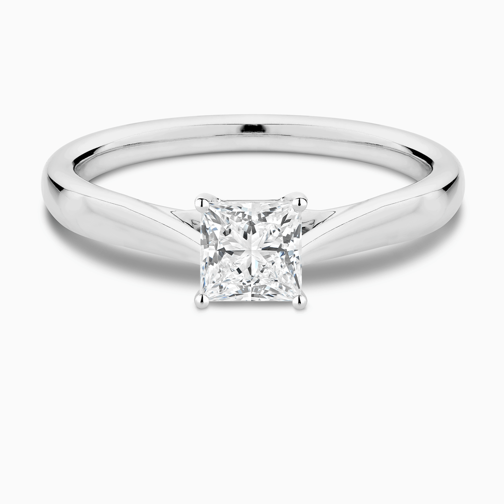 The Ecksand Iconic Tapered Band Solitaire Diamond Engagement Ring with Secret Heart shown with  in Default Title