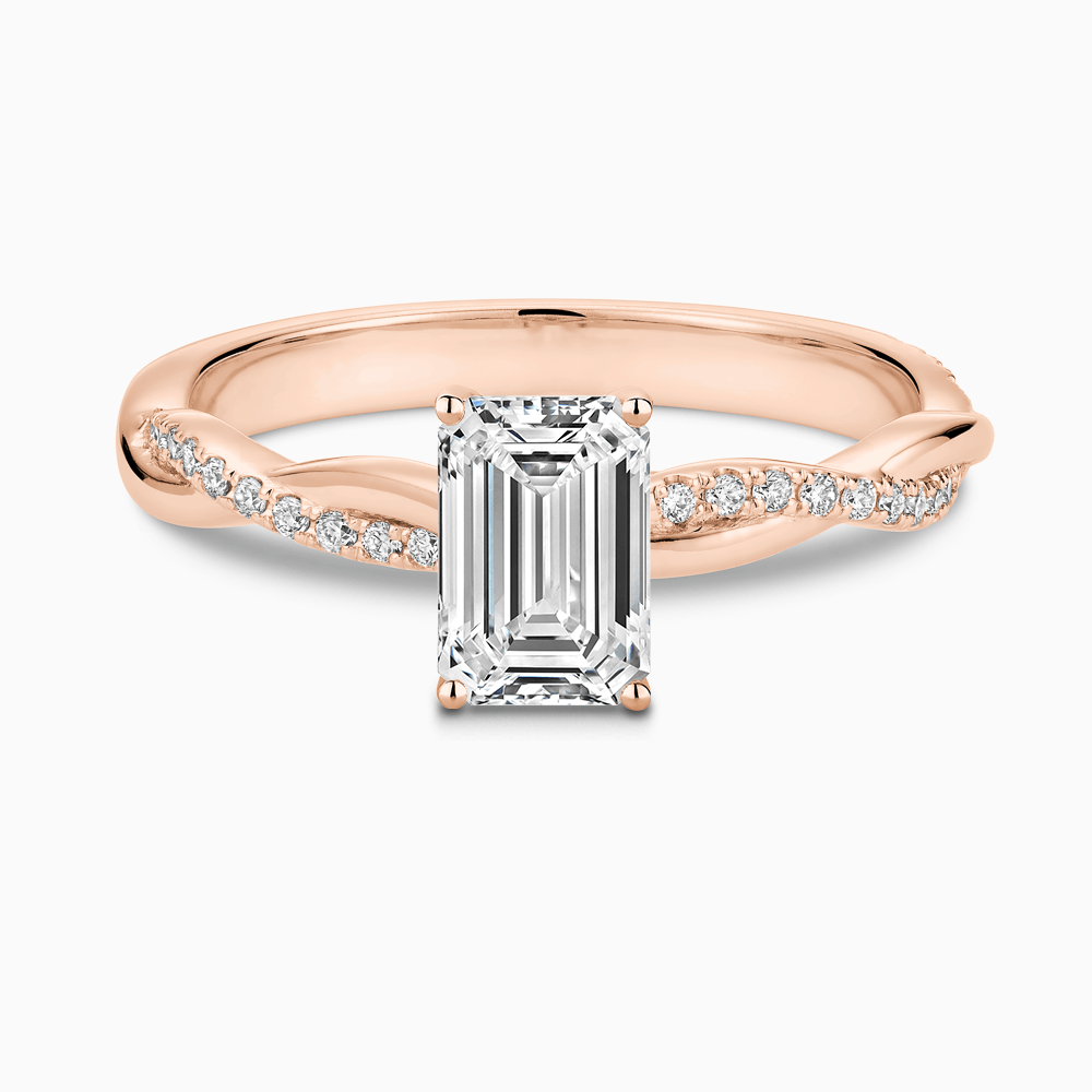 The Ecksand Iconic Diamond Engagement Ring with Secret Heart and Twisted Diamond Band shown with Emerald in 14k Rose Gold