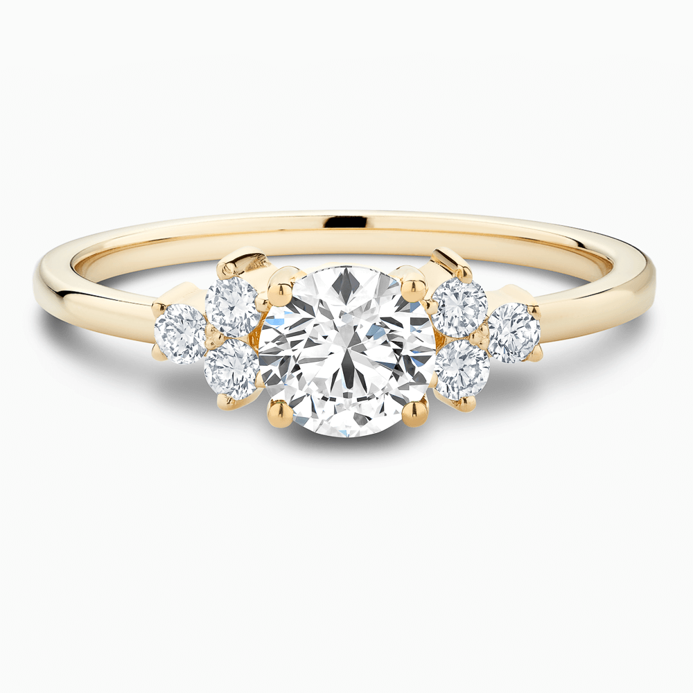 The Ecksand Diamond Engagement Ring with Six Side Diamonds shown with Round in 18k Yellow Gold