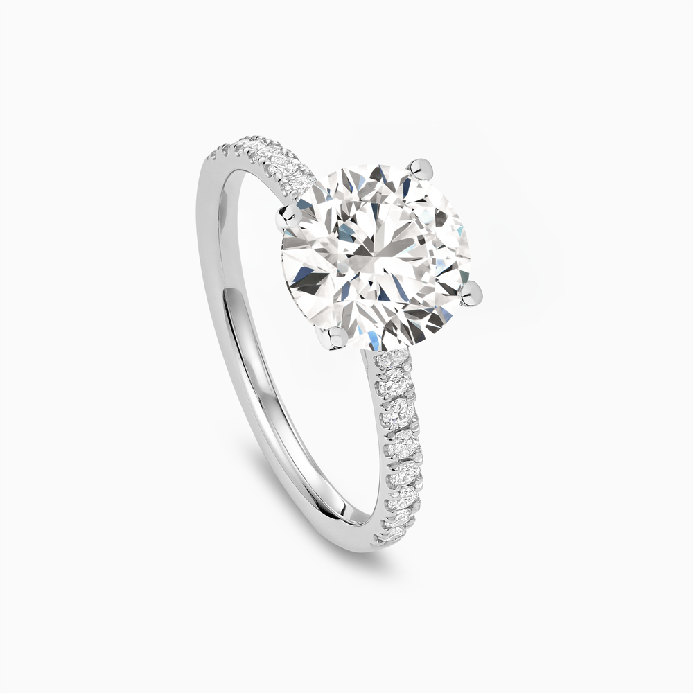 The Ecksand Four-Prong Engagement Ring with Diamond Pavé shown with  in 