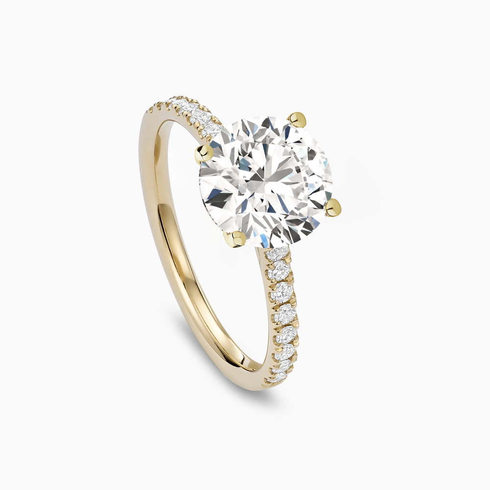 The Ecksand Four-Prong Engagement Ring with Diamond Pavé shown with  in 