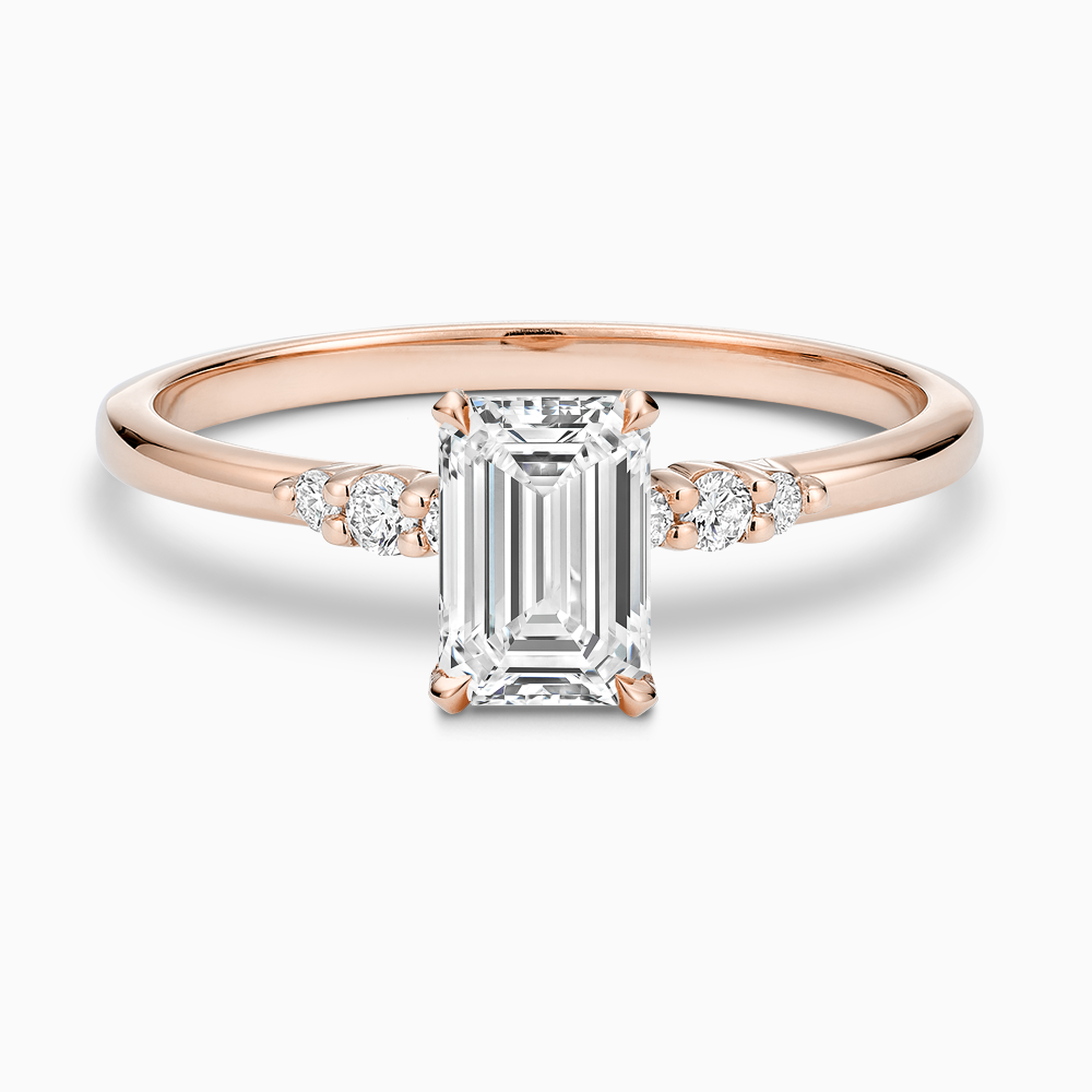 The Ecksand Engagement Ring with Eagle Prongs and Side Diamonds shown with Emerald in 14k Rose Gold