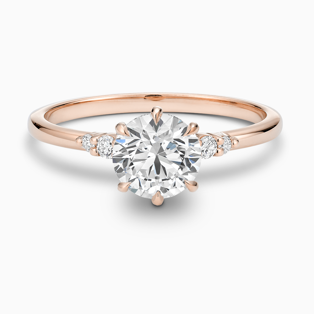 The Ecksand Engagement Ring with Eagle Prongs and Side Diamonds shown with Round in 14k Rose Gold