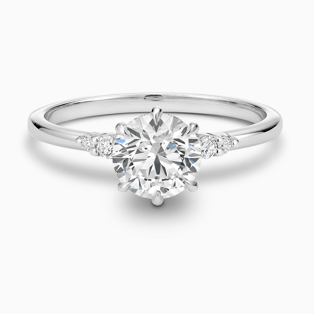 Ecksand's Engagement Ring with Eagle Prongs and Side Diamonds in Platinum, Round