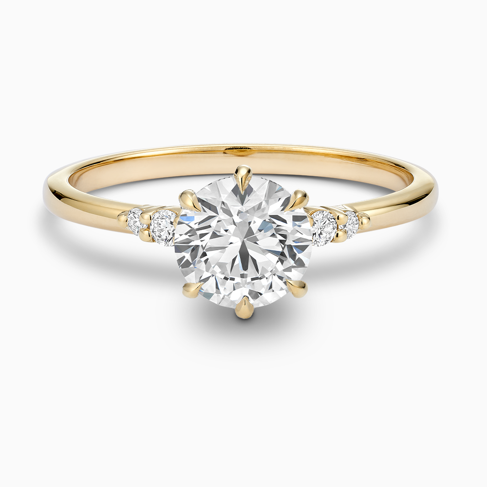 Ecksand's Engagement Ring with Eagle Prongs and Side Diamonds in 18k Yellow Gold, Round