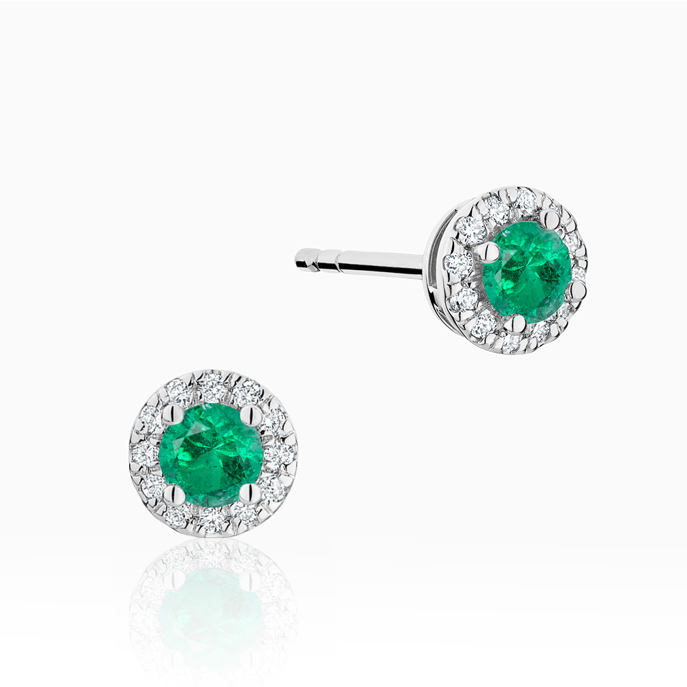 Canadian-made emerald and diamond halo stud earrings in 18K white gold.