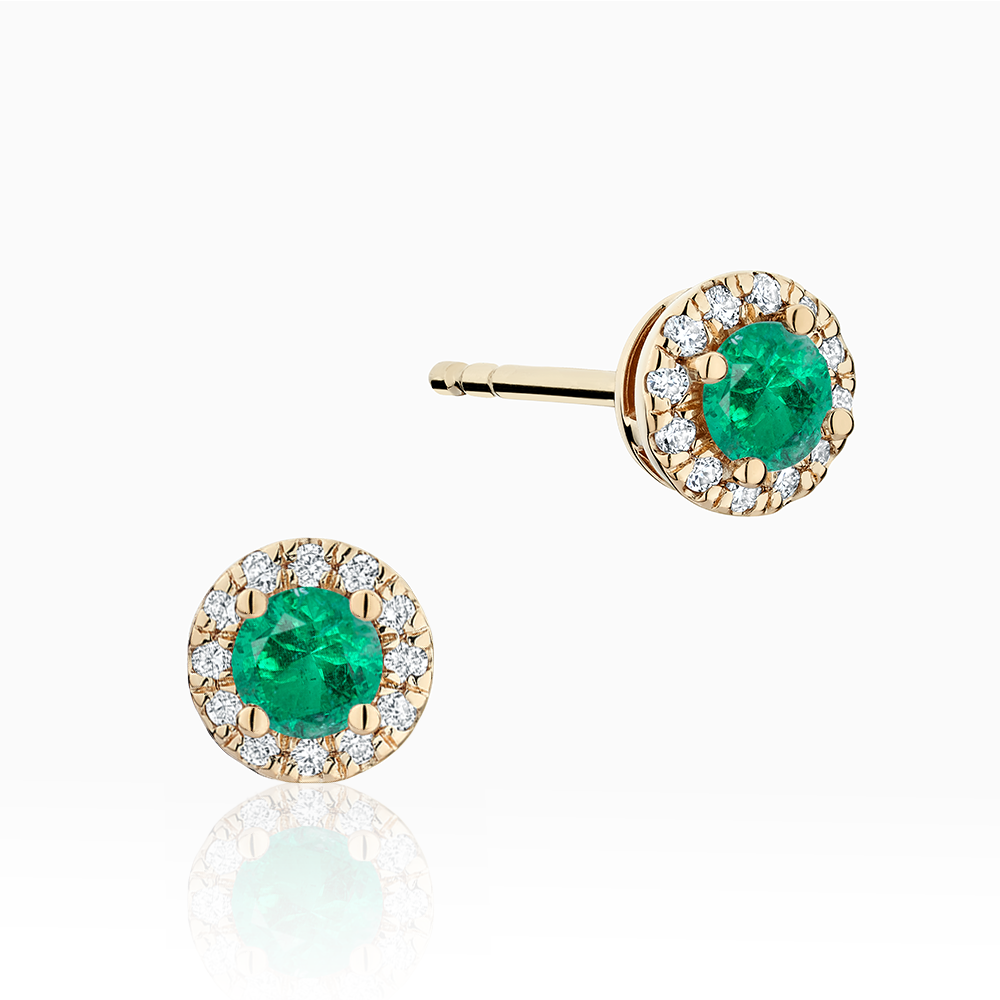 Canadian-made emerald and diamond halo stud earrings in 18K yellow gold.