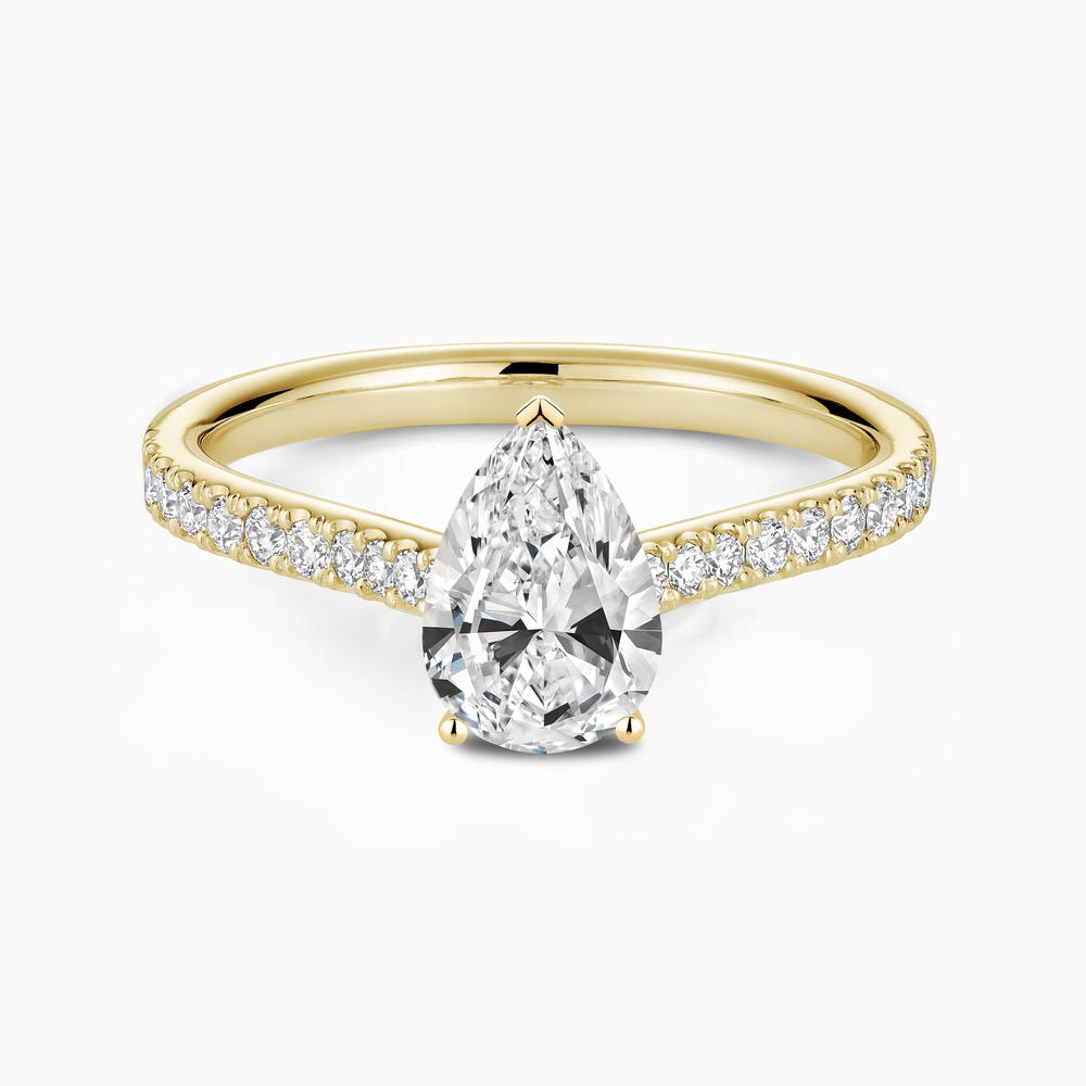 The Ecksand Four-Prong Engagement Ring with Diamond Pavé shown with Pear in 14k Yellow Gold