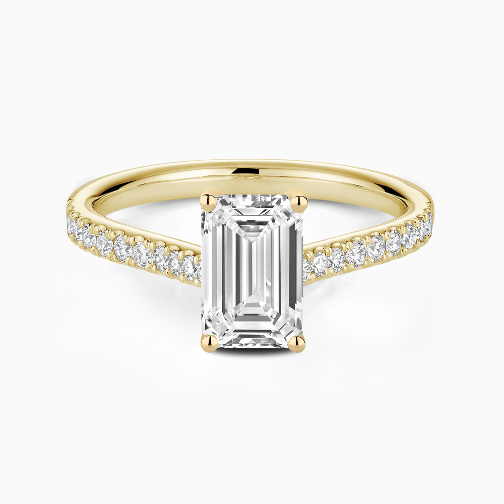 The Ecksand Four-Prong Engagement Ring with Diamond Pavé shown with Emerald in 14k Yellow Gold